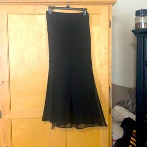 Long black chiffon skirt.